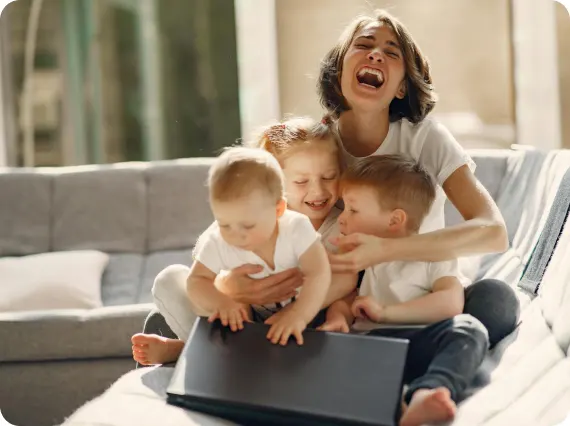 Mum hugs her children